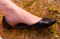 high arches in pointy black flats